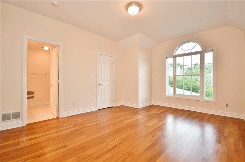 115 Haverford Circle Pittsburgh, PA 15228 - Photo 15 of 25 Heading upstairs to the 2nd floor, one finds bedroom 2, which has an ensuite full bath. This bedroom could be used as a second master suite. Also on the 2nd floor, there is a spacious walk-in storage room!