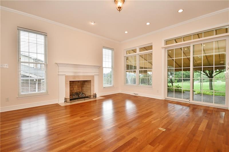115 Haverford Circle Pittsburgh, PA 15228 - Photo 3 of 25 Main 1st floor living room, with gas fireplace, leads out to the private back patio.