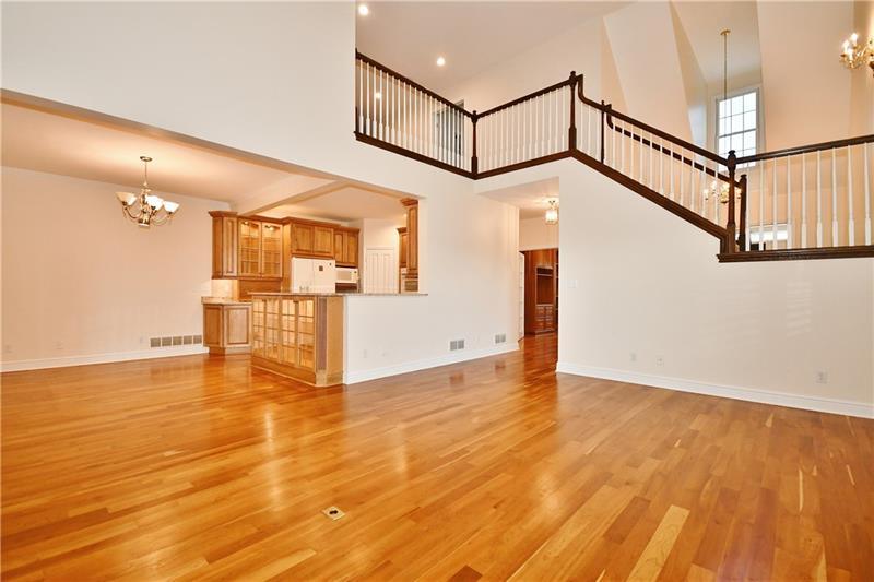 115 Haverford Circle Pittsburgh, PA 15228 - Photo 8 of 25 Another view of the main 1st floor space, with stairway leading to the 2nd floor.