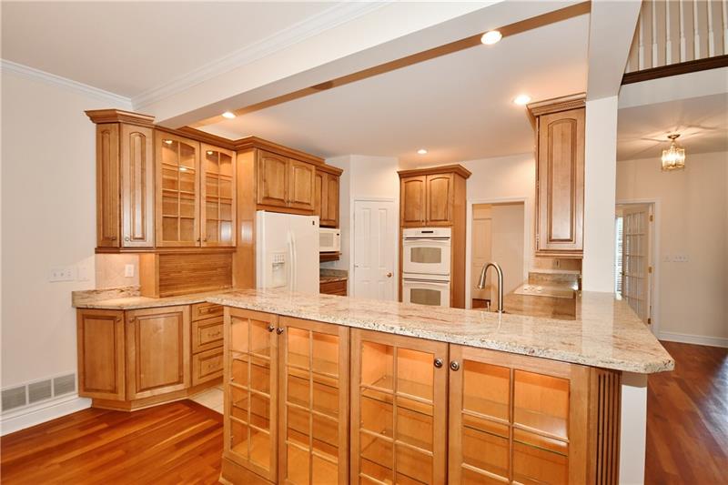 115 Haverford Circle Pittsburgh, PA 15228 - Photo 9 of 25 View of main 1st floor kitchen, fully equipped, with under cabinet lighting, granite countertops, and dual oven.