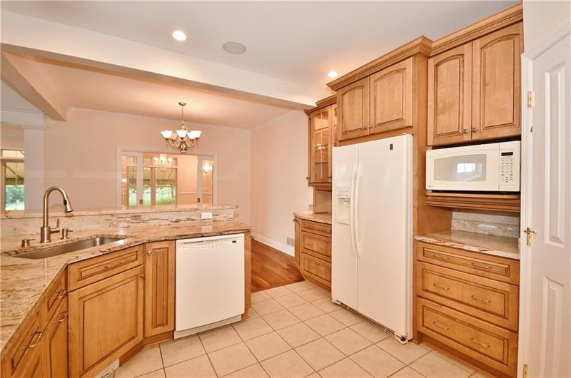 115 Haverford Circle Pittsburgh, PA 15228 - Photo 10 of 25 Main 1st floor kitchen leads into a casual dining area.