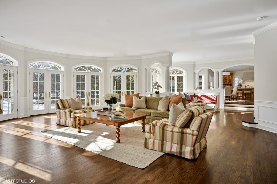 106 Woodley Road Winnetka, IL 60093 - Photo 15 of 44 a living room with furniture fireplace and wooden floor