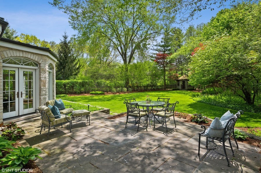 106 Woodley Road Winnetka, IL 60093 - Photo 22 of 44 a view of yard with seating area and green space