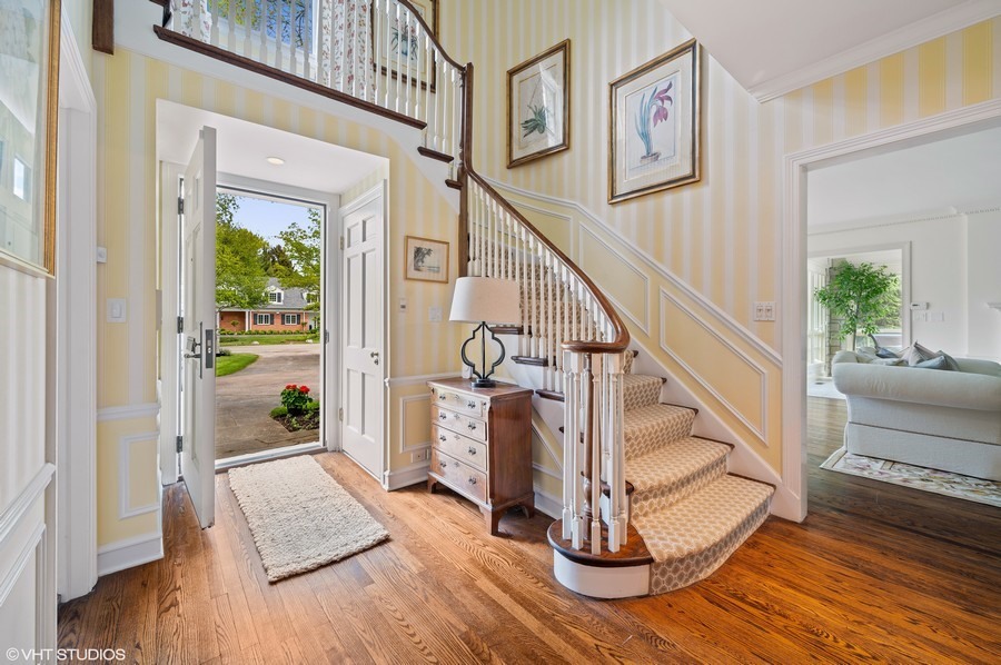 106 Woodley Road Winnetka, IL 60093 - Photo 3 of 44 a view of entryway and hall with wooden floor