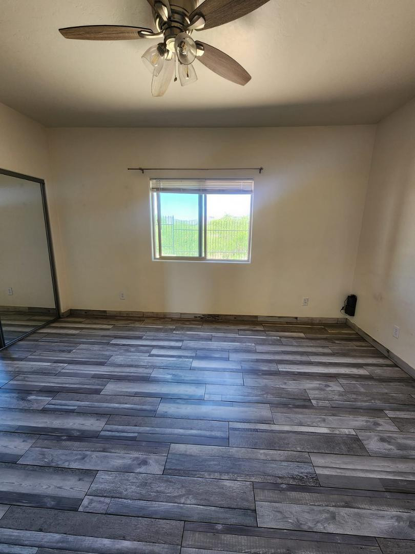 3641 Camino Del Rancho Douglas, AZ 85607 - Photo 7 of 20 a view of room and wooden floor