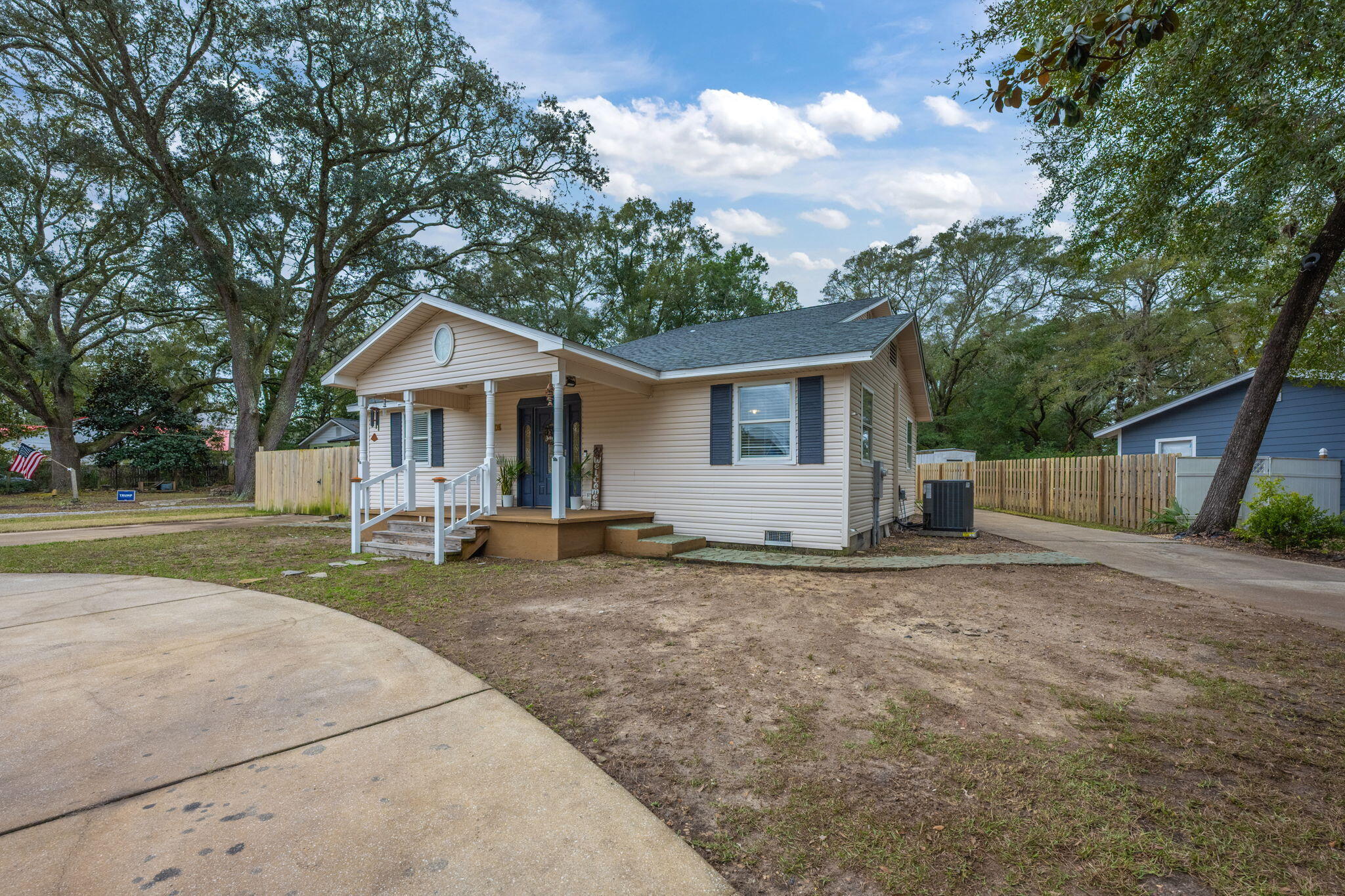 255 Edge Avenue Valparaiso, FL 32580 - Photo 3 of 73 a view of a house with a yard and large trees
