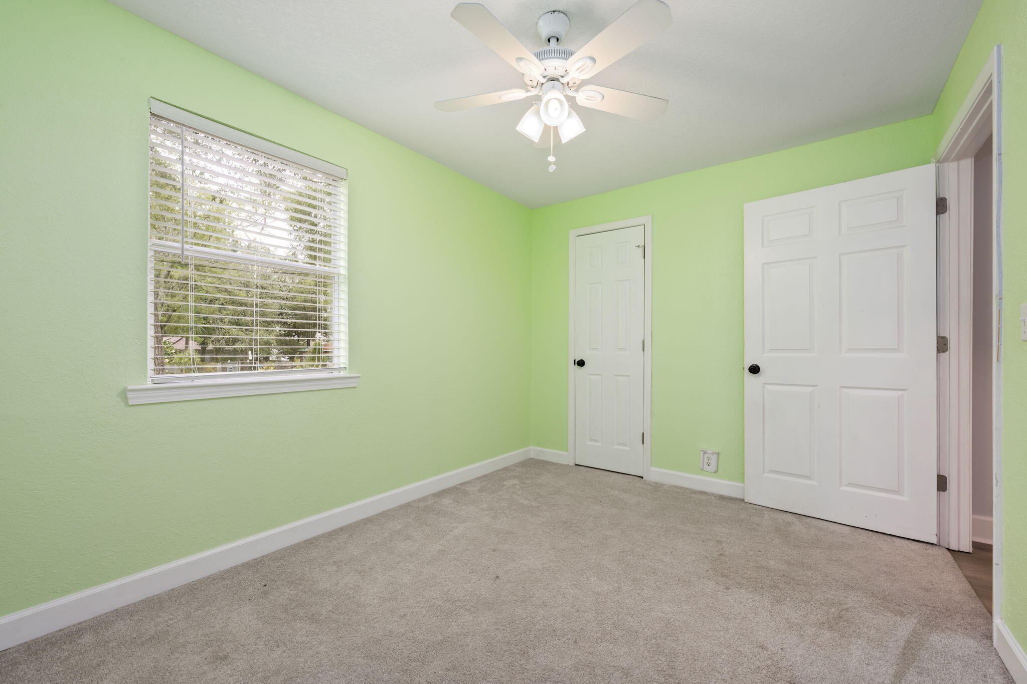 255 Edge Avenue Valparaiso, FL 32580 - Photo 39 of 73 a view of an empty room with a window