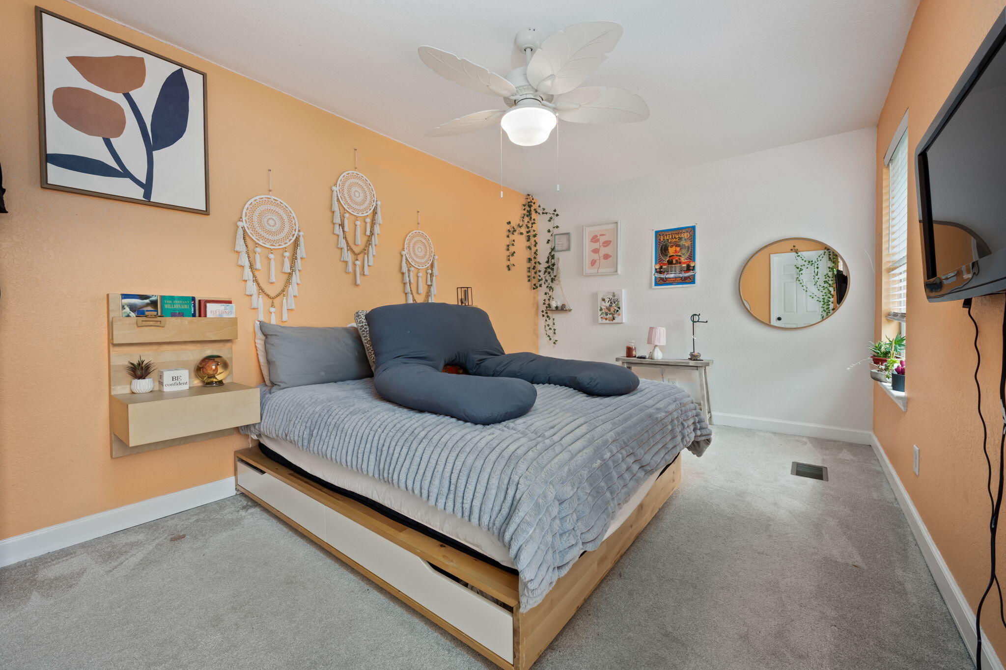 255 Edge Avenue Valparaiso, FL 32580 - Photo 45 of 73 a bedroom with a bed and a chandelier