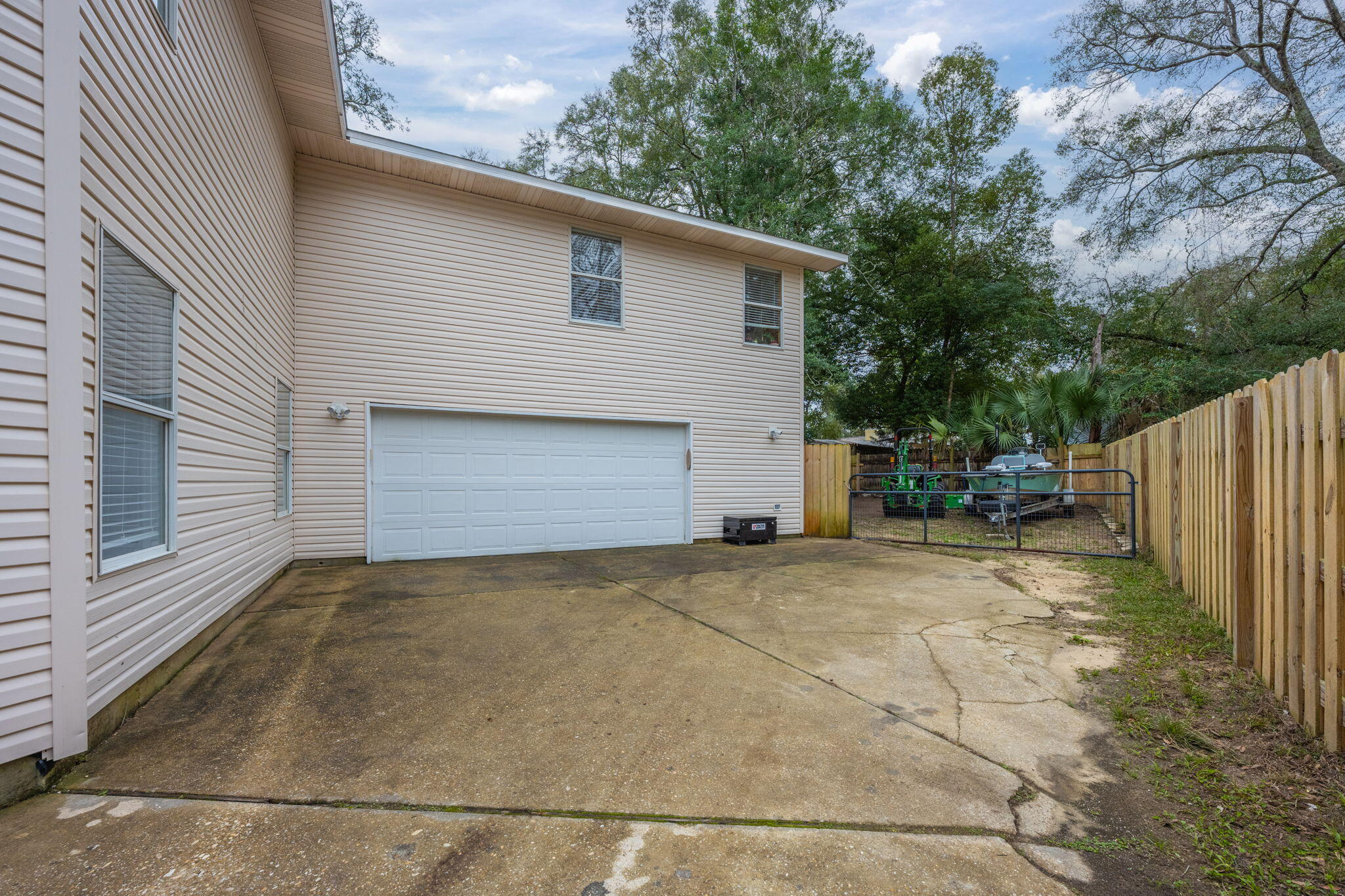 255 Edge Avenue Valparaiso, FL 32580 - Photo 62 of 73 a view of backyard of house with wooden fence