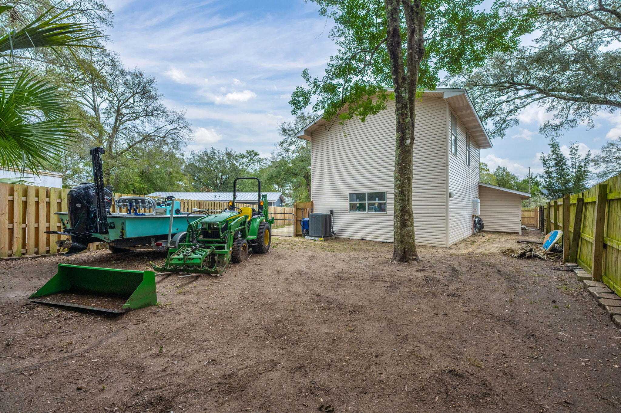 255 Edge Avenue Valparaiso, FL 32580 - Photo 64 of 73 a view of a house with backyard and a tree