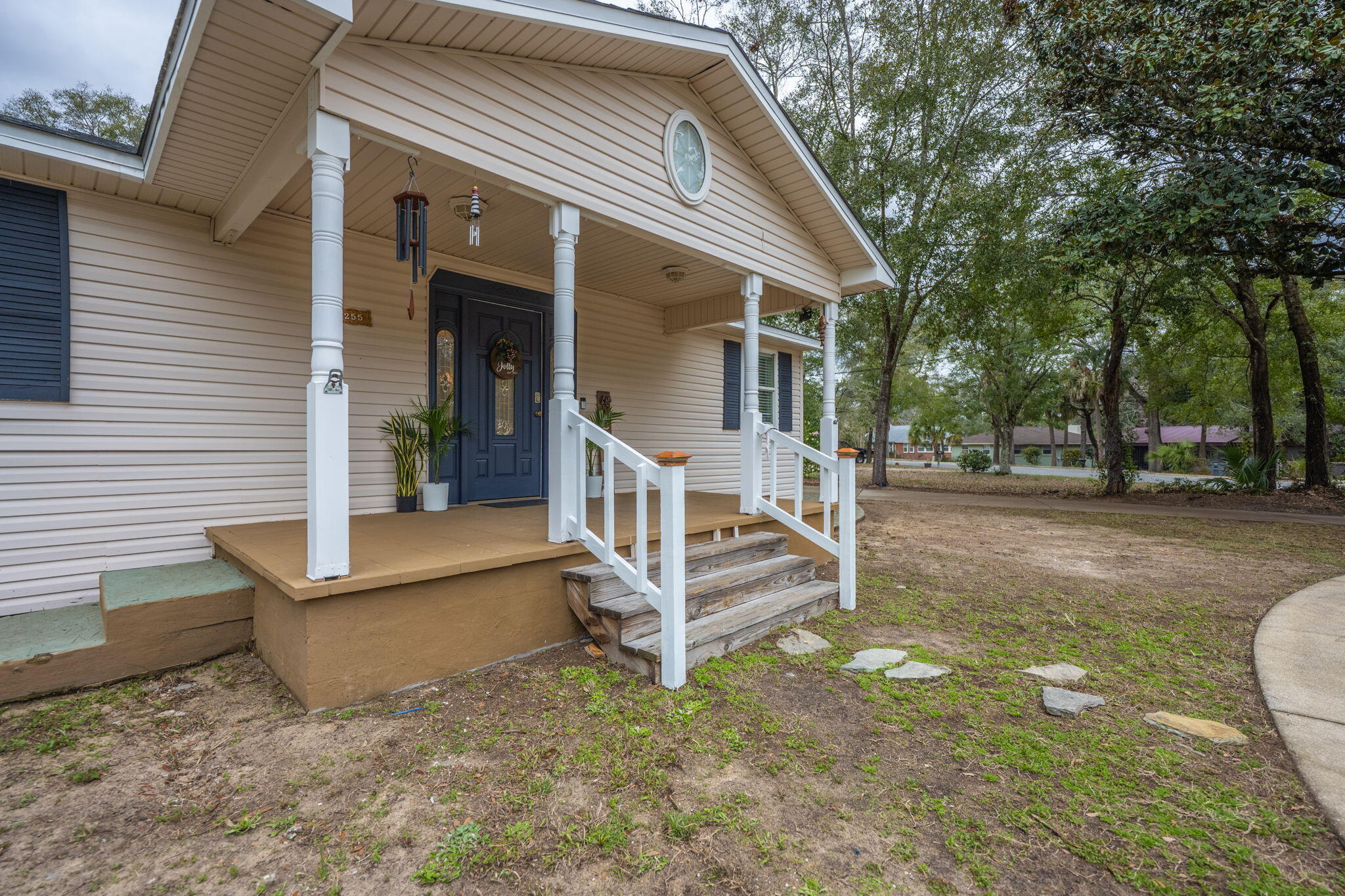 255 Edge Avenue Valparaiso, FL 32580 - Photo 67 of 73 a view of a house with backyard and a tree