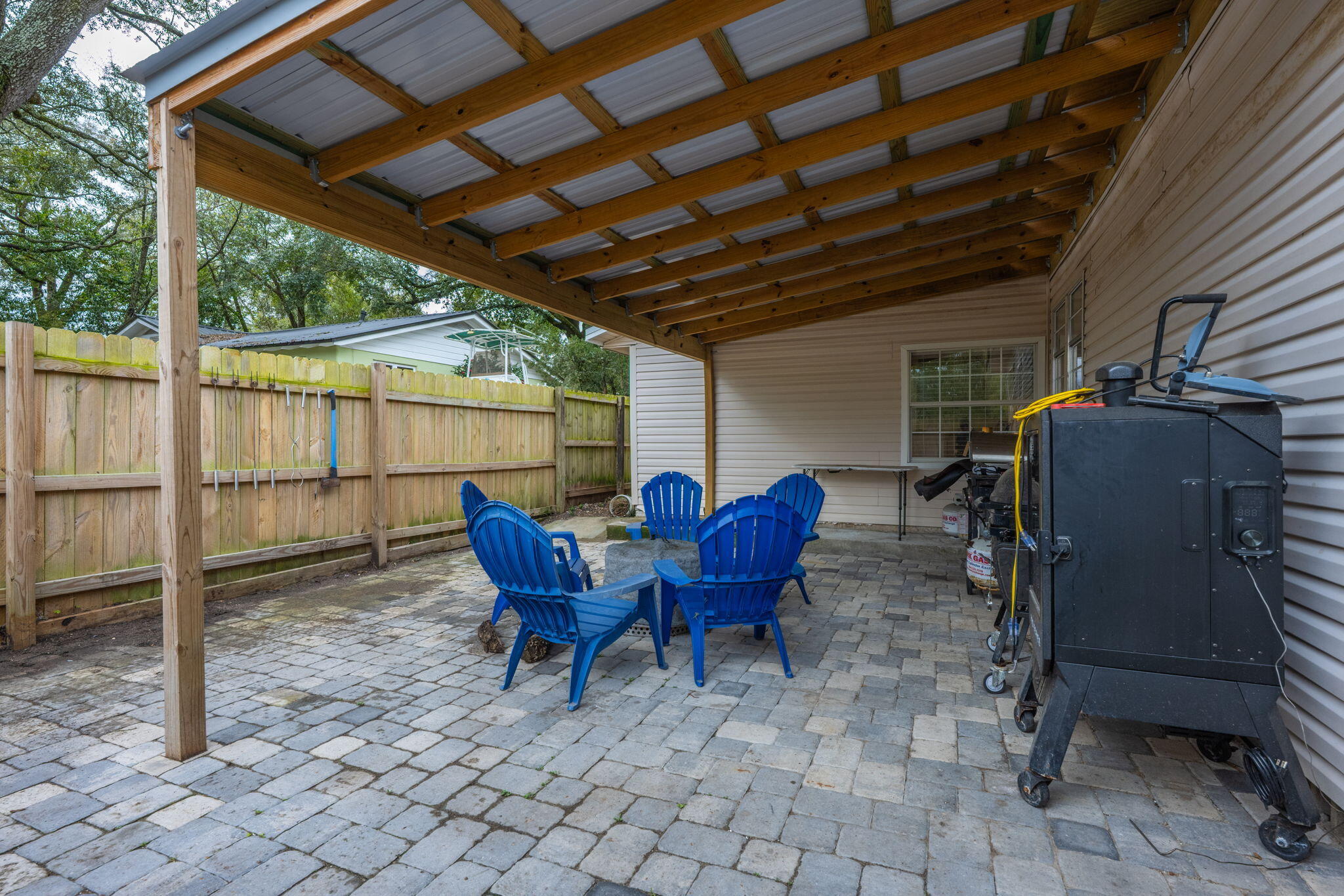 255 Edge Avenue Valparaiso, FL 32580 - Photo 69 of 73 a view of a porch with furniture and a yard
