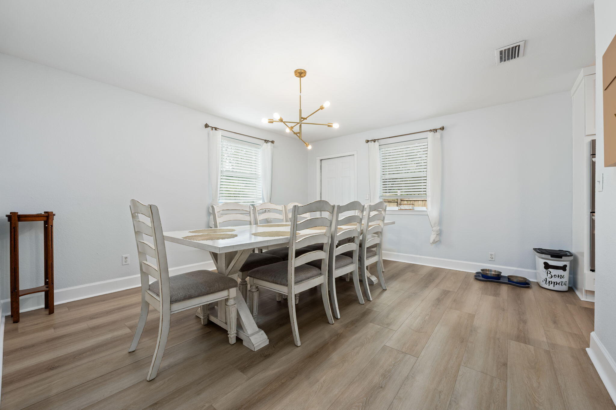 255 Edge Avenue Valparaiso, FL 32580 - Photo 6 of 73 a view of a dining room with furniture window and wooden floor
