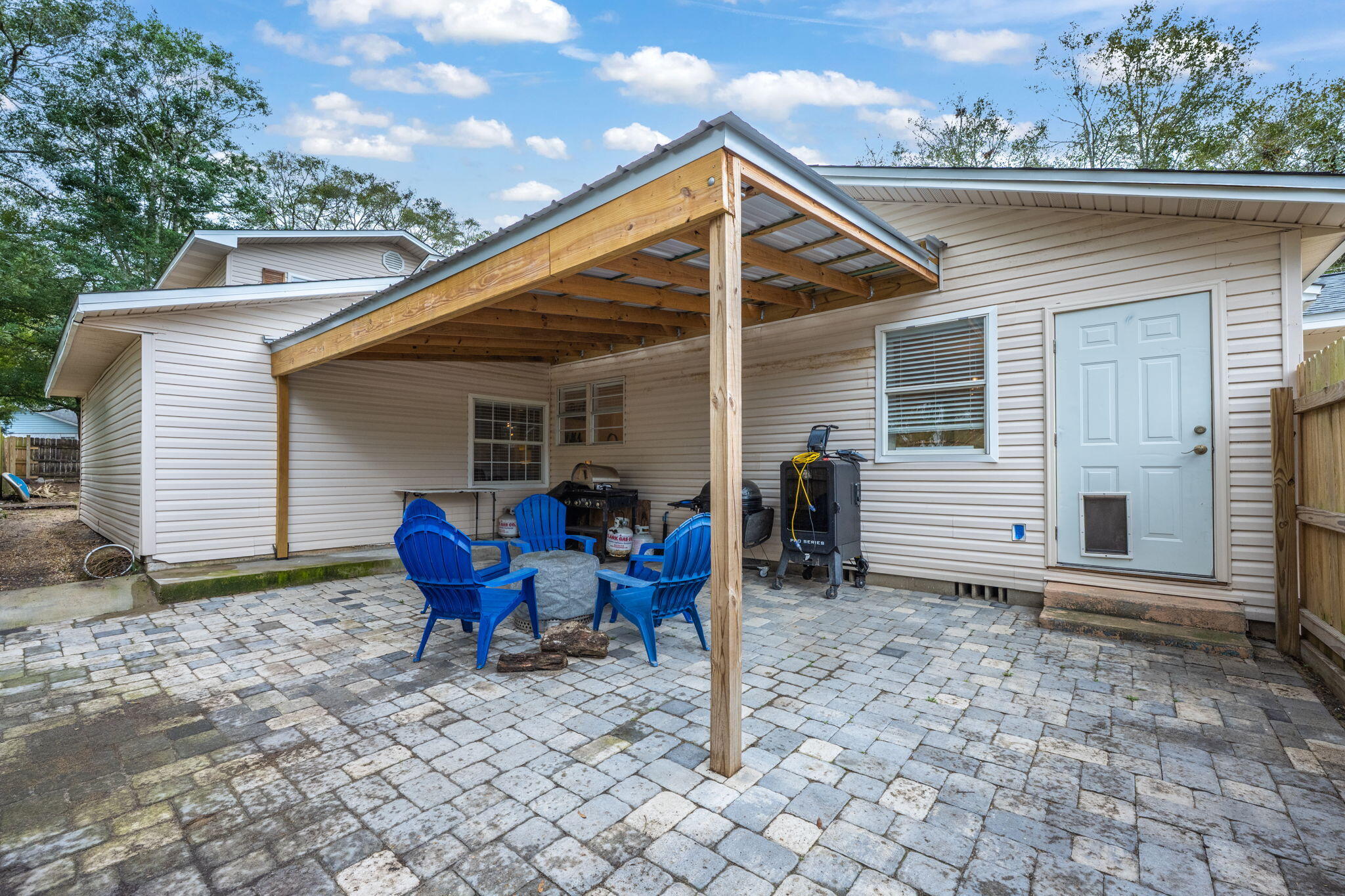255 Edge Avenue Valparaiso, FL 32580 - Photo 70 of 73 a view of a house with a yard chairs and wooden fence