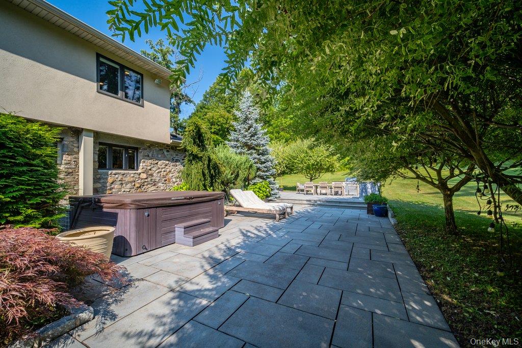237 Mineral Springs Road Highland Mills, NY 10930 - Photo 9 of 32 View of patio / terrace with a hot tub