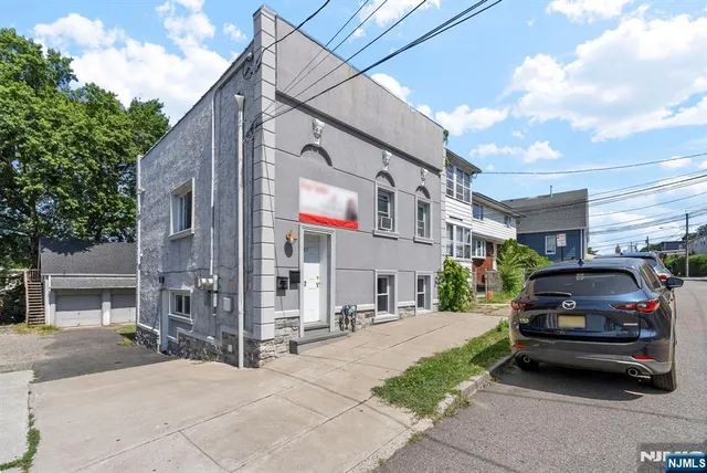 a car parked in front of a building