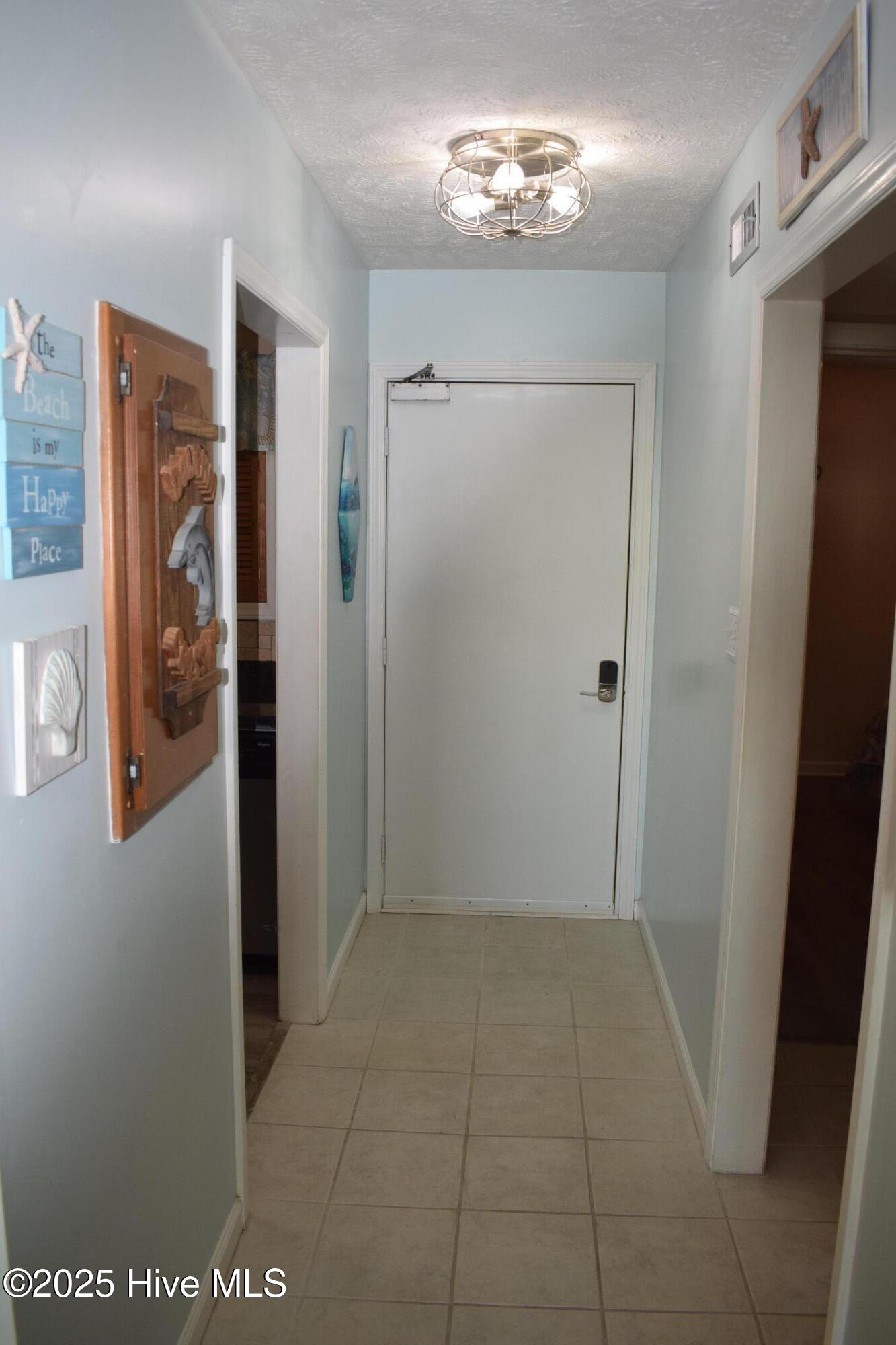 1000 Caswell Beach Road, Unit 405 Oak Island, NC 28465 - Photo 5 of 38 DSC_0722