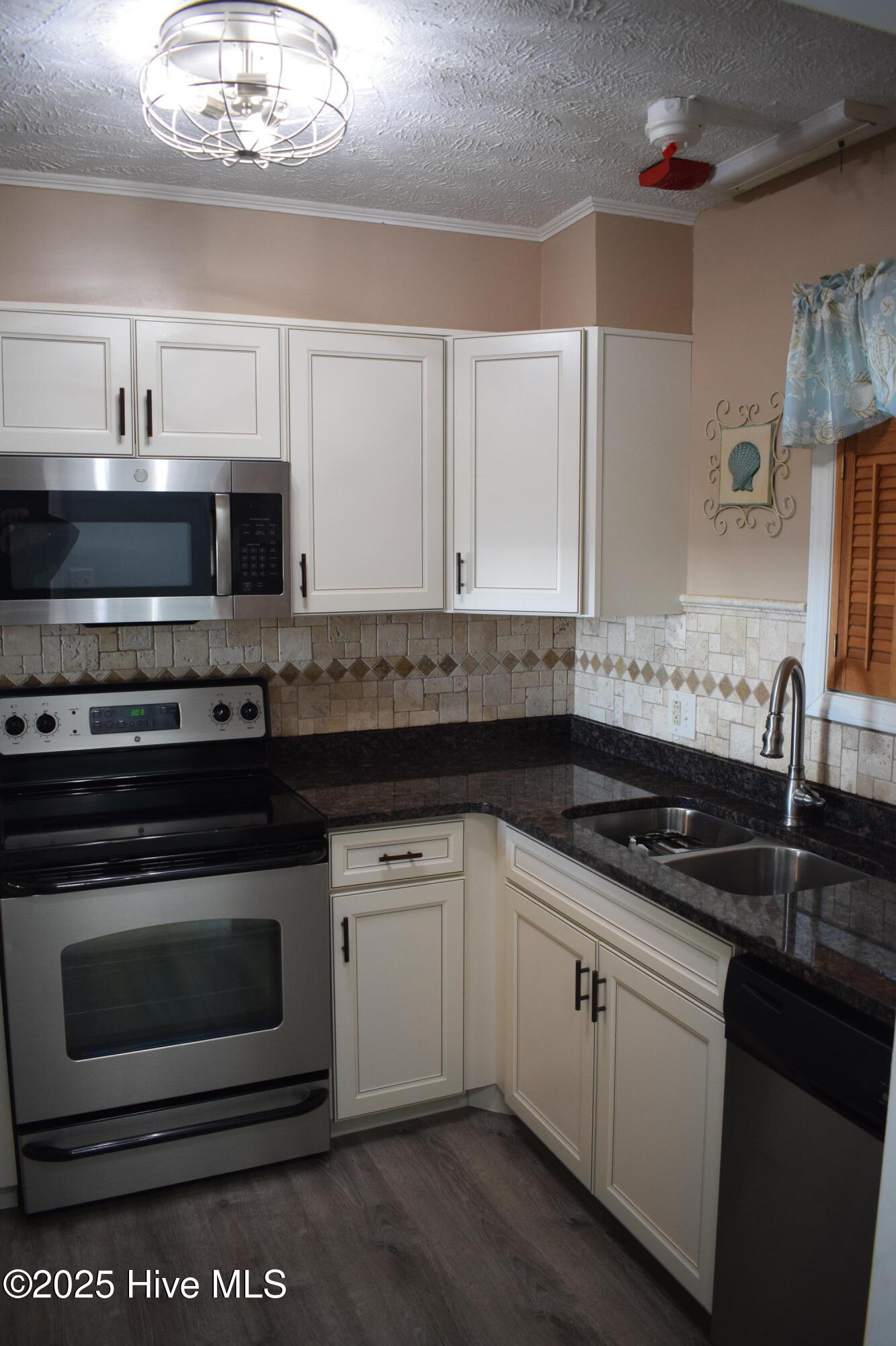 1000 Caswell Beach Road, Unit 405 Oak Island, NC 28465 - Photo 6 of 38 DSC_0663