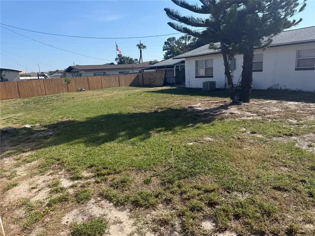 a view of a porch with a yard