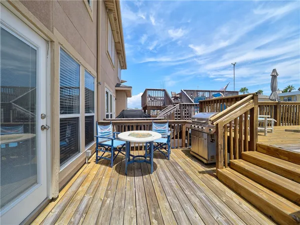 a view of a terrace with chairs