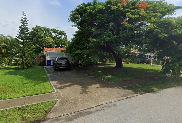 a house view with a garden space