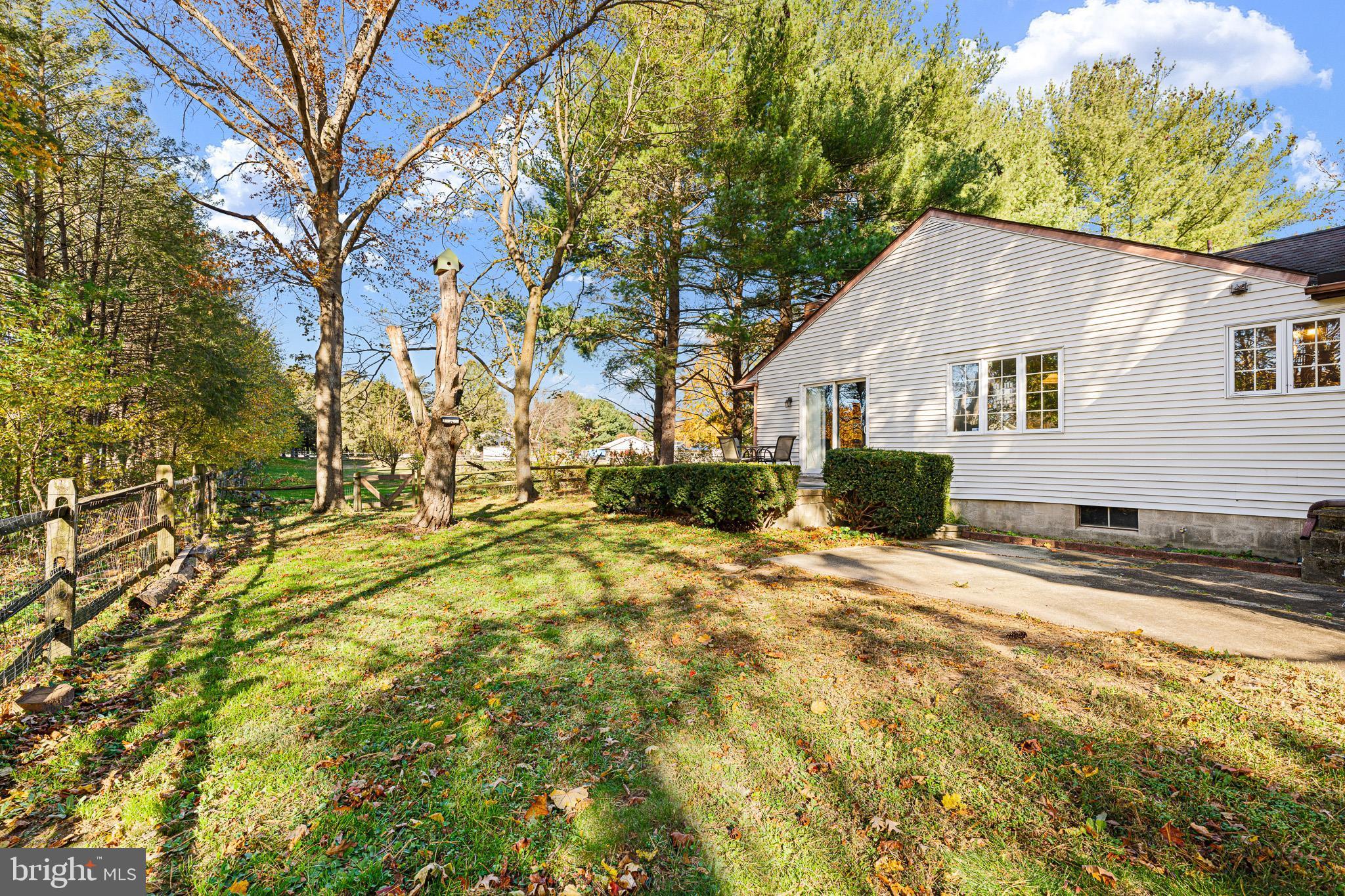 2209 Wheatleys Pond Road Smyrna, DE 19977 - Photo 28 of 39 a view of a house with a yard covered with snow