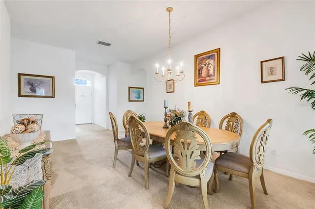 a view of a dining room with furniture