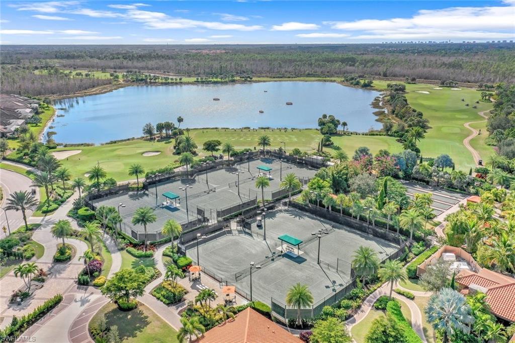 9393 Pocida Court, Unit 104 Naples, FL 34119 - Photo 28 of 28 an aerial view of a city