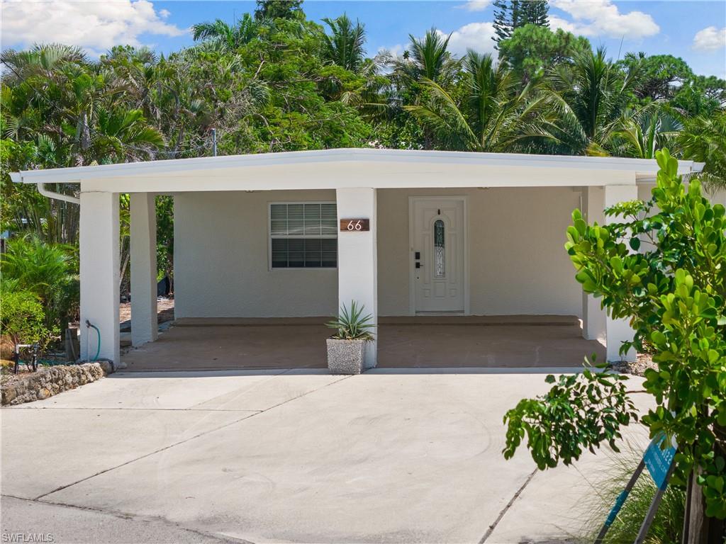 66 River Court Naples, FL 34110 - Photo 25 of 29 a view of a garage