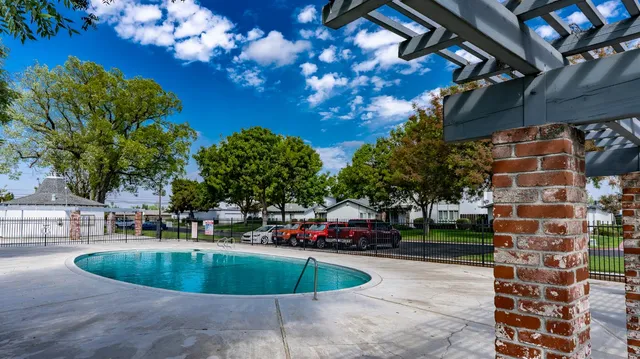 a view of pool with outdoor seating