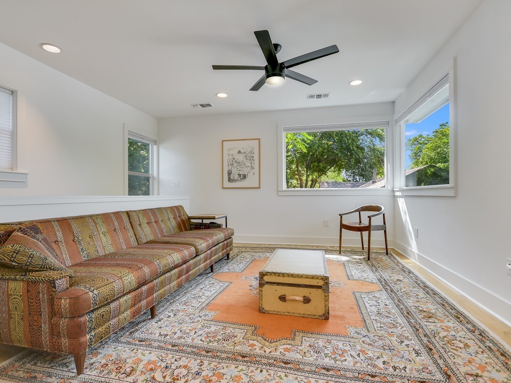 1313 Garden Street Austin, TX 78702 - Photo 15 of 23 a living room with furniture and a window