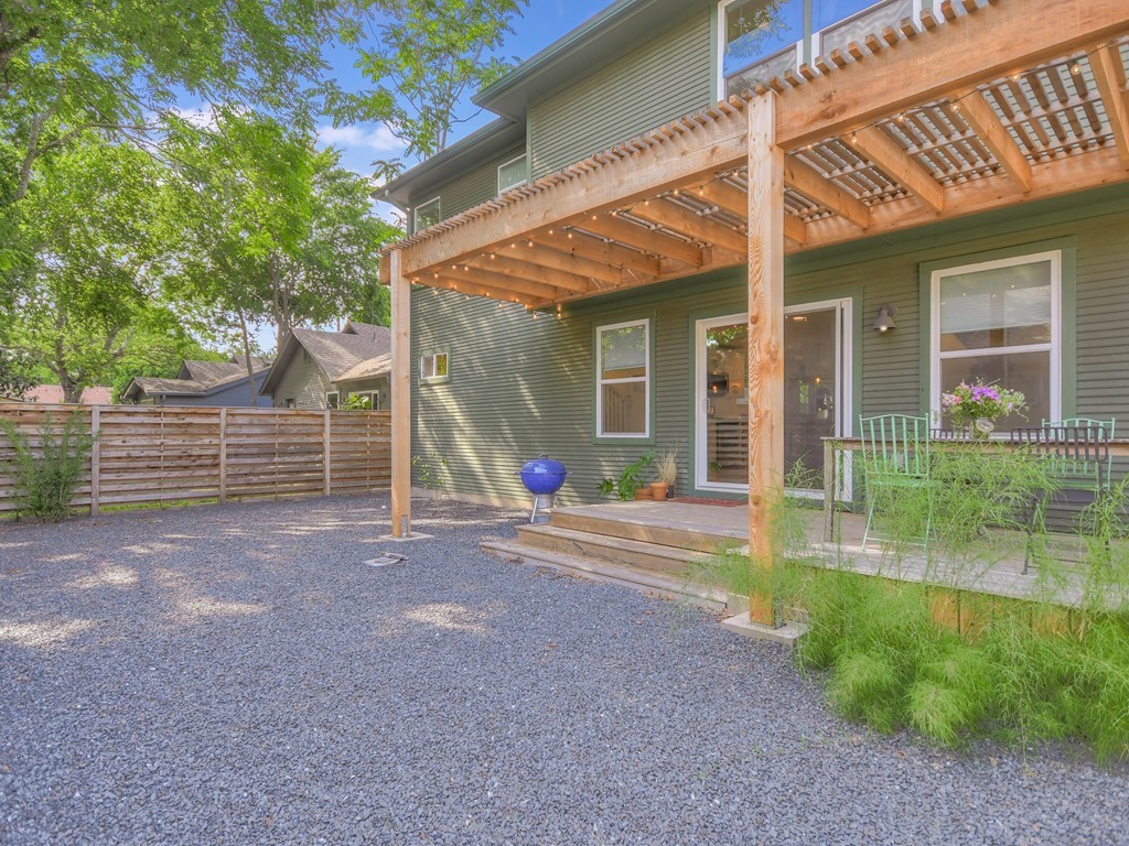 1313 Garden Street Austin, TX 78702 - Photo 22 of 23 a view of a house with a yard and sitting area
