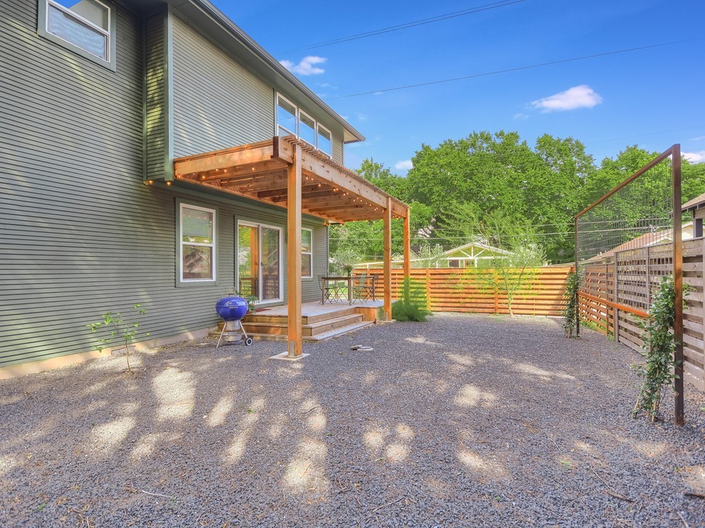 1313 Garden Street Austin, TX 78702 - Photo 23 of 23 a view of a house with backyard and sitting area