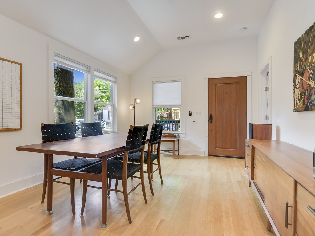 1313 Garden Street Austin, TX 78702 - Photo 5 of 23 a view of a dining room with furniture and a potted plant