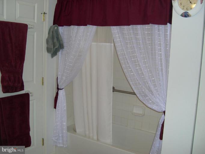 9603 Haven Farm Road, Unit 9603E Perry Hall, MD 21128 - Photo 7 of 14 LARGE BATHROOM WITH DOUBLE SIKK AND LINEN CLOSET