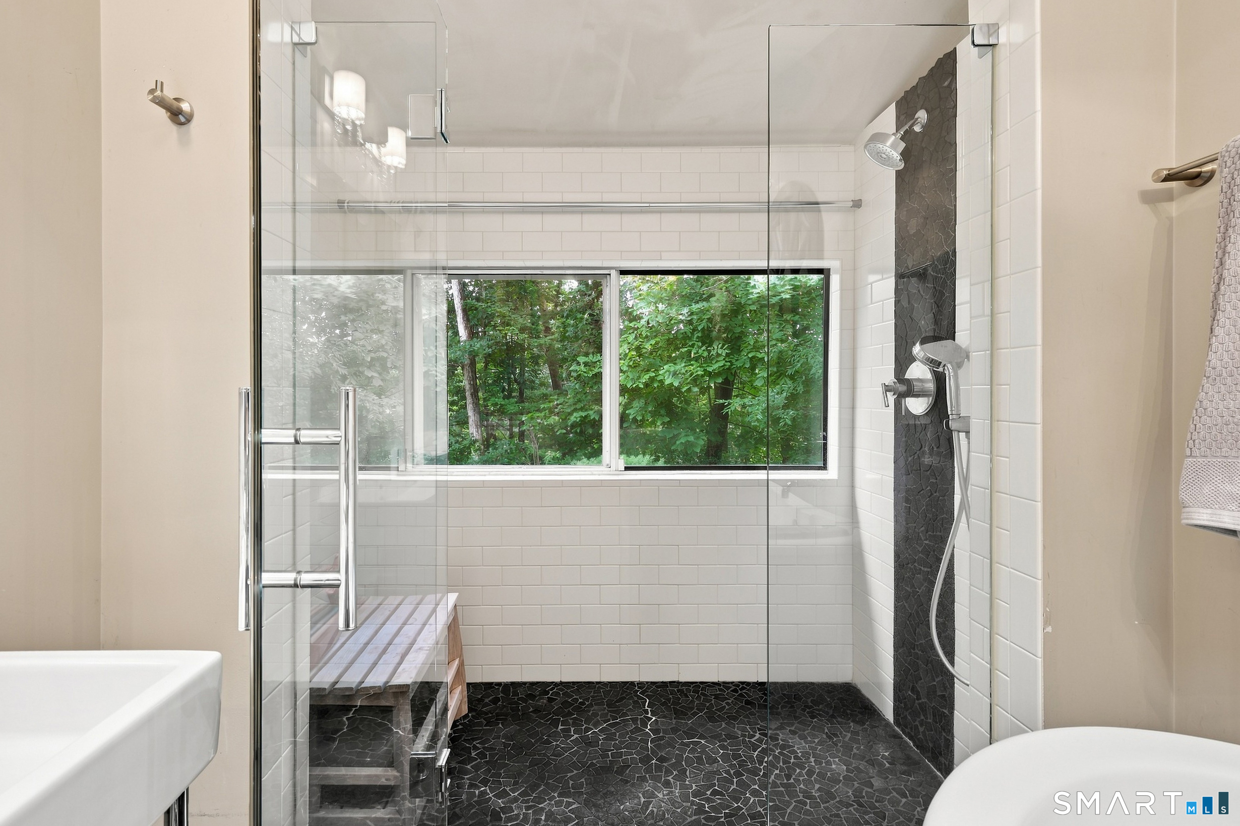 2004 Boston Post Road Guilford, CT 06437 - Photo 18 of 40 Walk-in shower with tile surround and glass enclosure.