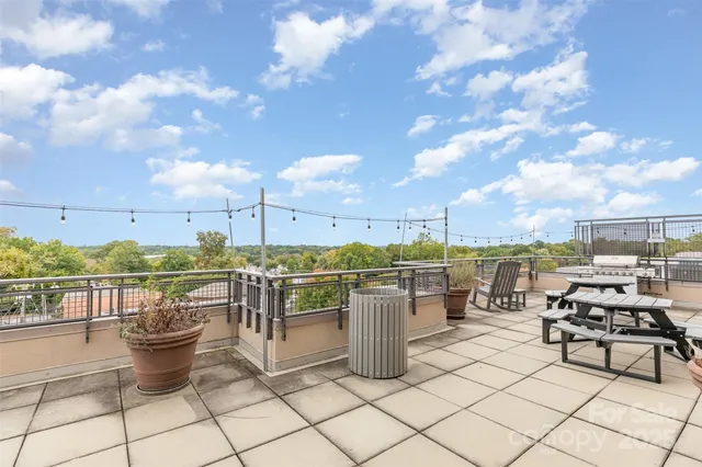 a view of a terrace with furniture