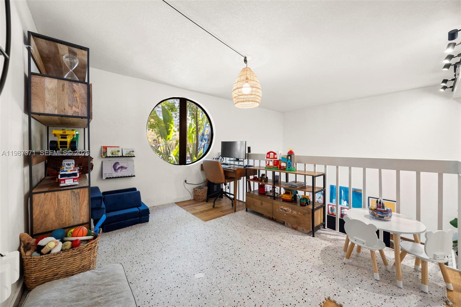 3237 Mary Street, Unit 6 Miami, FL 33133 - Photo 24 of 54 a living room with furniture and a wooden floor