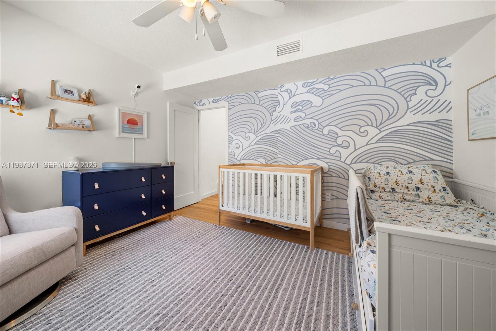 3237 Mary Street, Unit 6 Miami, FL 33133 - Photo 29 of 54 a bedroom with furniture and a window