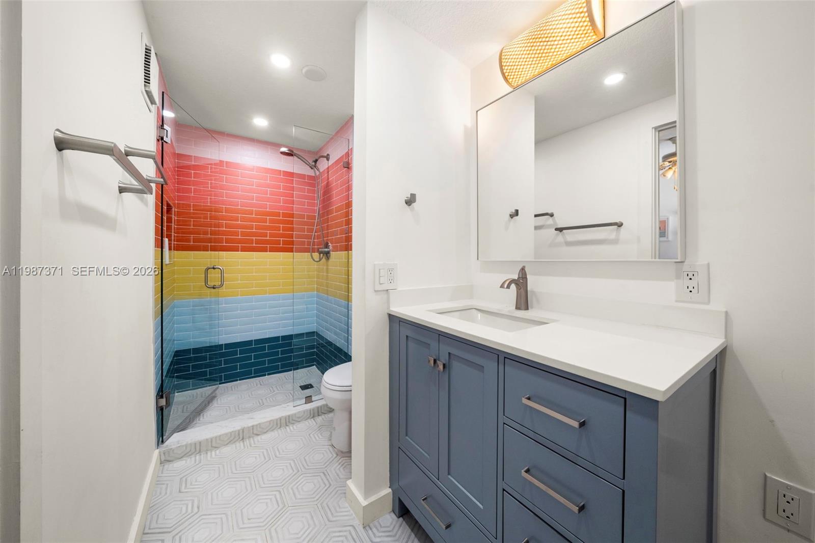 3237 Mary Street, Unit 6 Miami, FL 33133 - Photo 30 of 54 a bathroom with a sink a toilet and shower