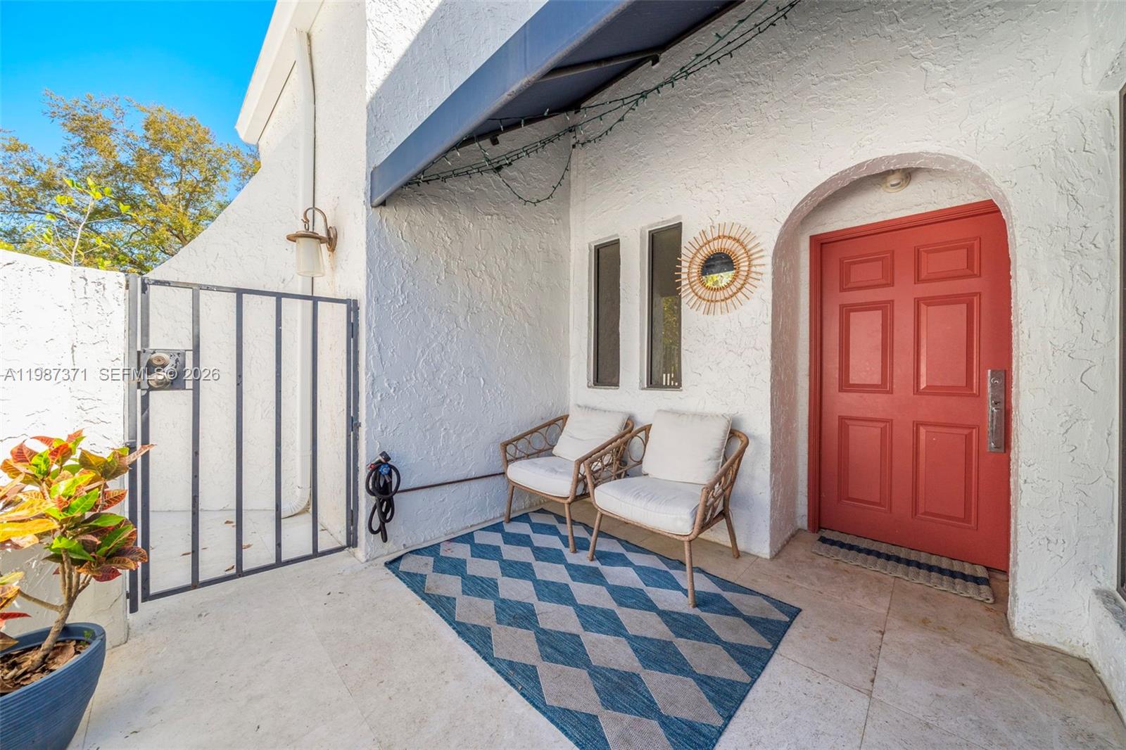 3237 Mary Street, Unit 6 Miami, FL 33133 - Photo 3 of 54 a view of front door with furniture