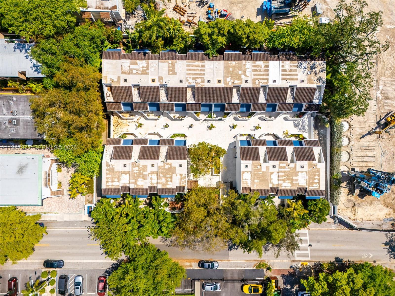 3237 Mary Street, Unit 6 Miami, FL 33133 - Photo 45 of 54 a picture of a building with a yard