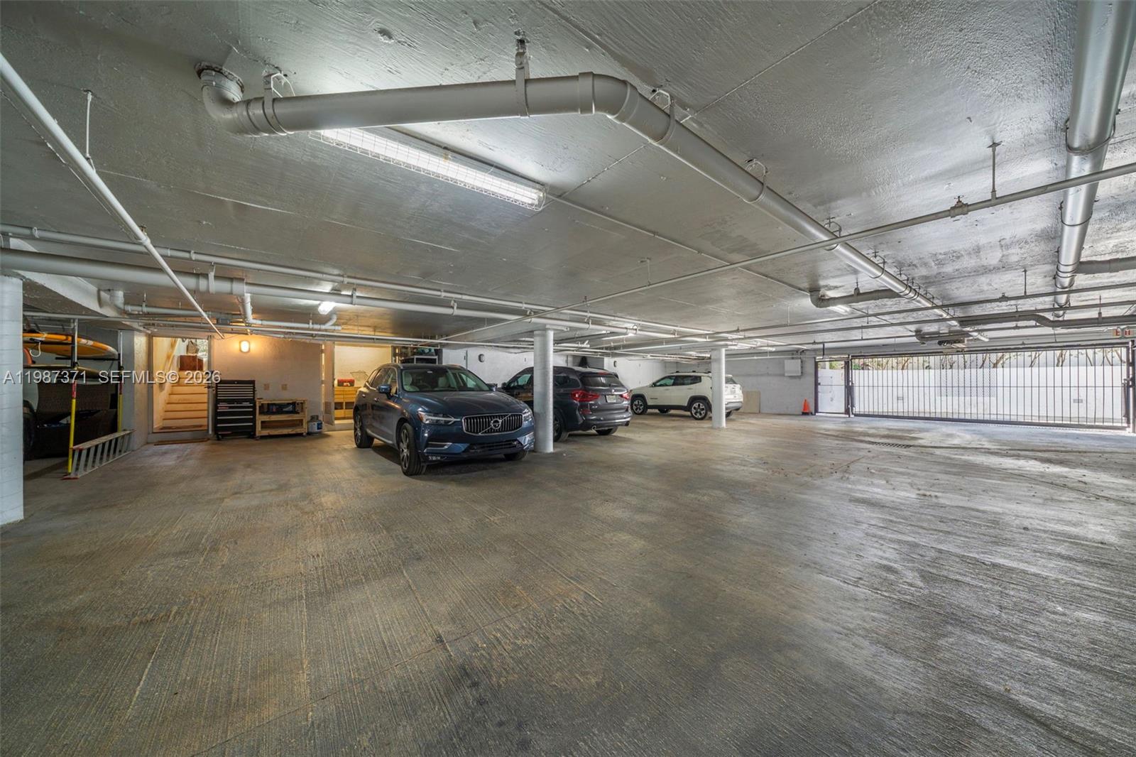 3237 Mary Street, Unit 6 Miami, FL 33133 - Photo 54 of 54 a view of parking garage with cars