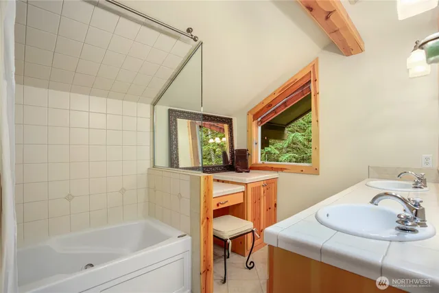 a bathroom with a sink and a bathtub