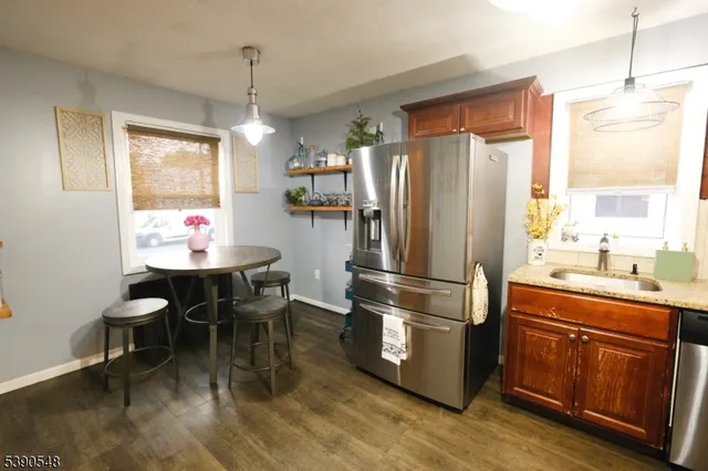 a living room with furniture and a clock