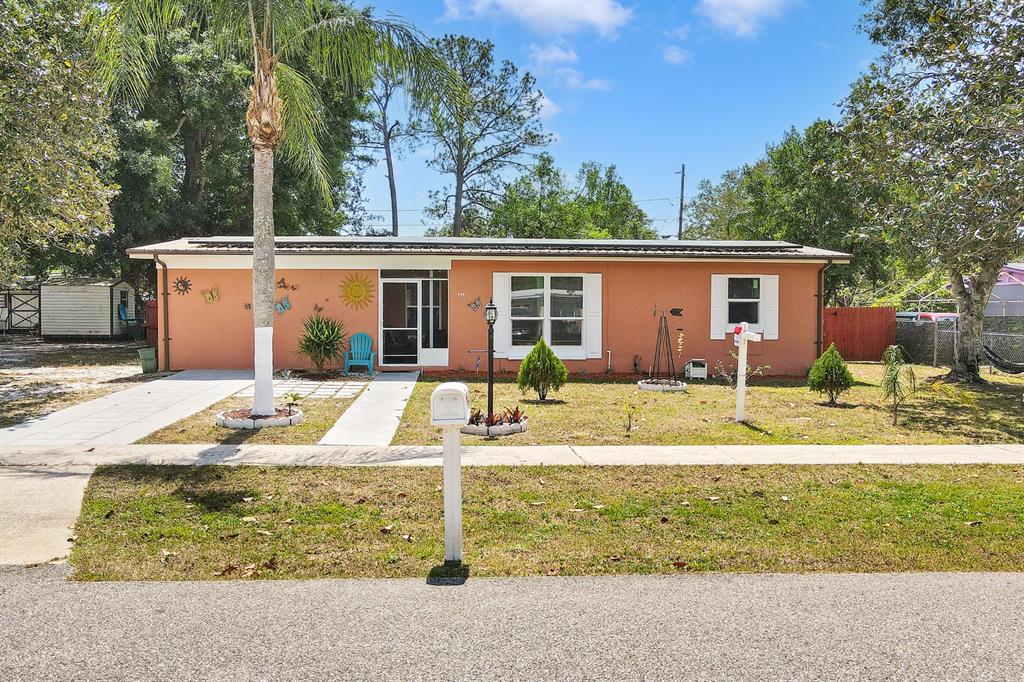 799 Halstead Street Deltona, FL 32725 - Photo 1 of 1 front view of a house with a yard