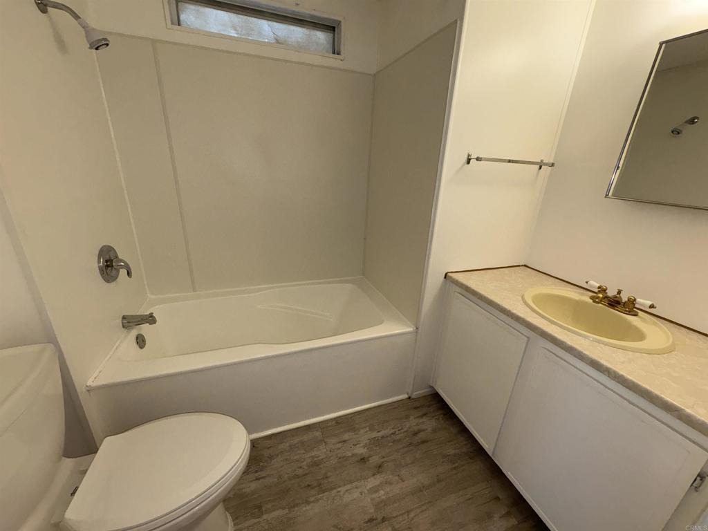 41 Hummingbird Lane Oceanside, CA 92057 - Photo 12 of 13 a bathroom with a sink and a toilet
