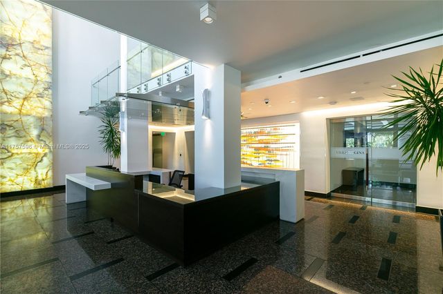 a living room filled with furniture and gym equipment