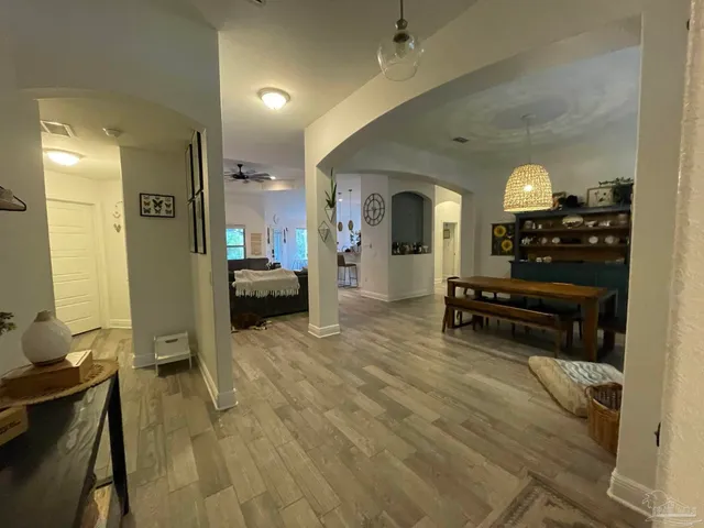 a view of living room and kitchen with furniture
