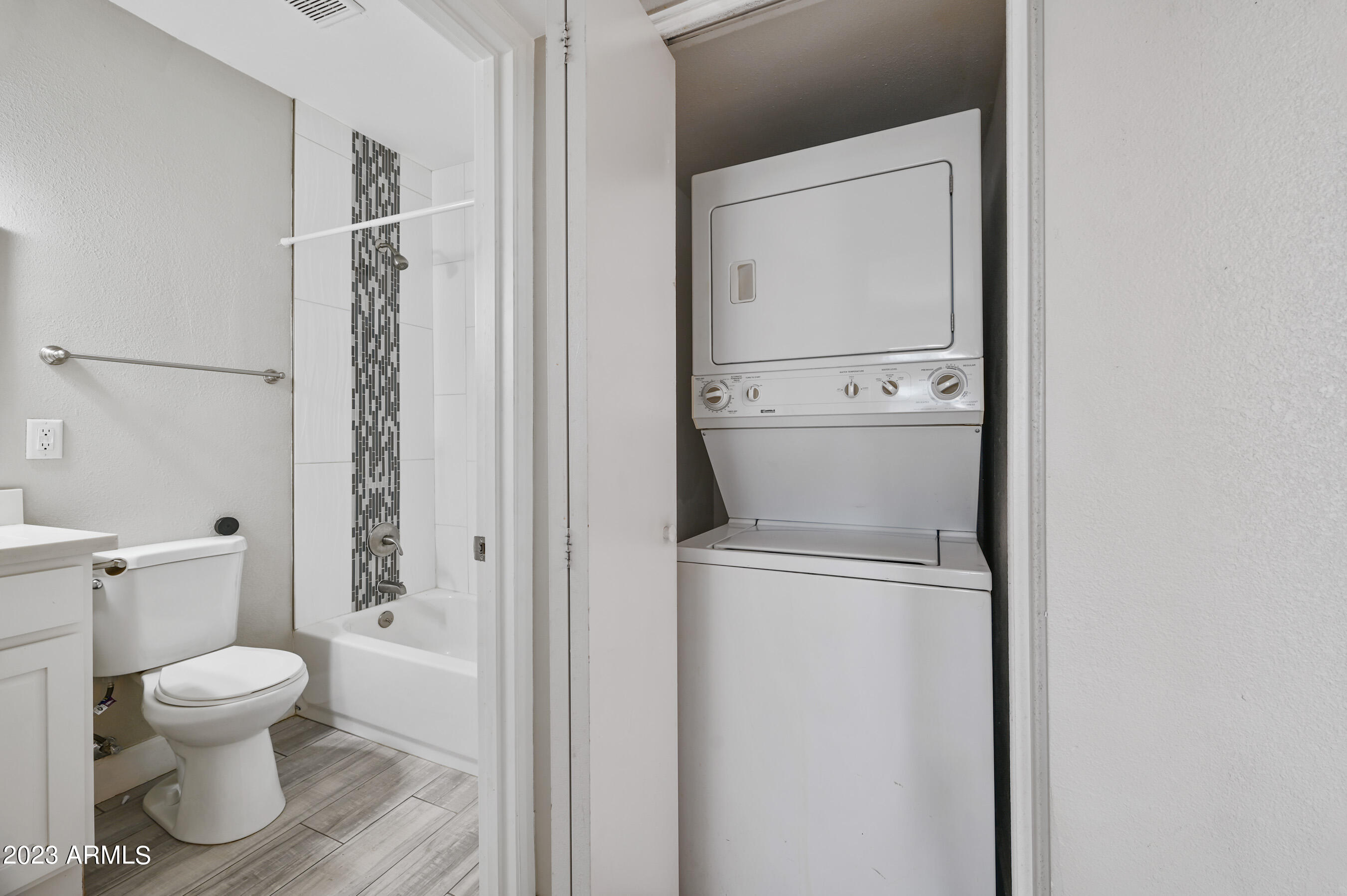 1145 East Henry Street Tempe, AZ 85288 - Photo 13 of 15 a bathroom with a toilet and a shower
